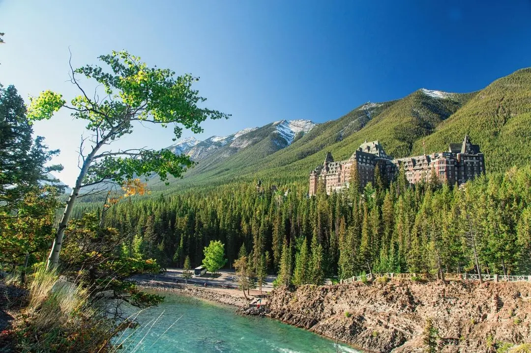 19th century imposing hotel overlooking river in Banff National Park