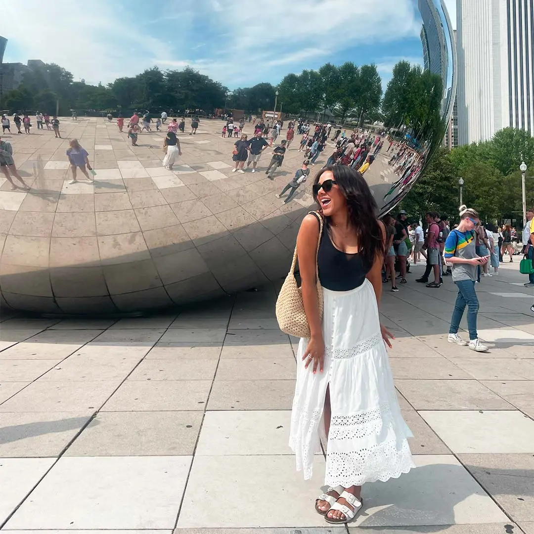 Girl beside bean in Chicago