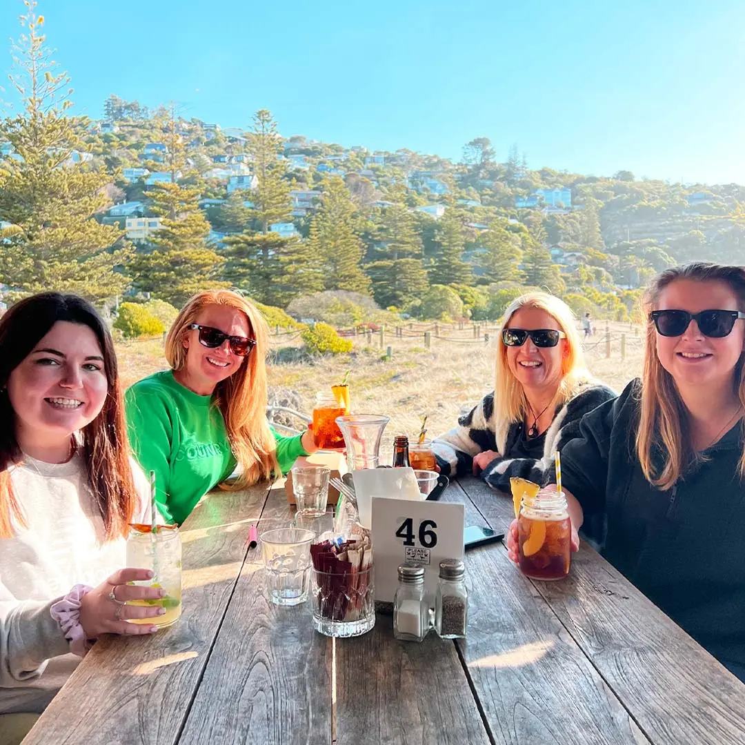 Girls having a drink in the sun