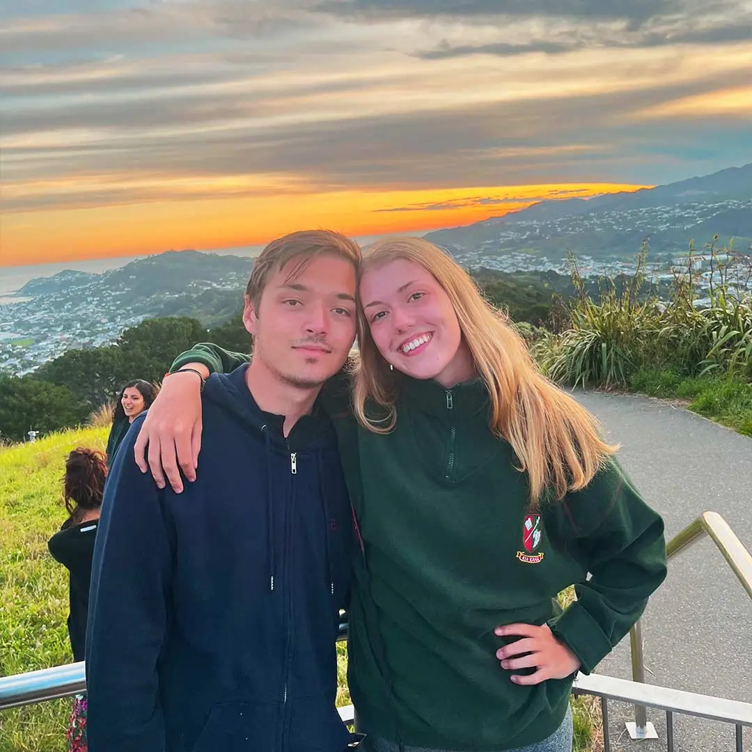 Girl and guy with view over city