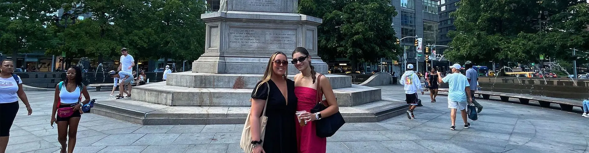 2 grils pose in NYC