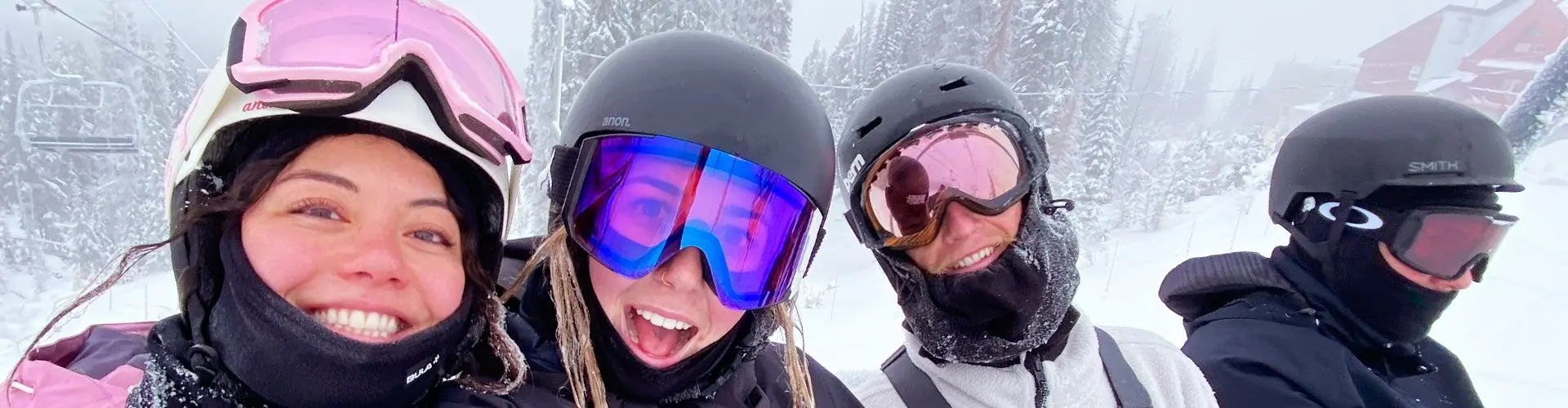 4 friends on a ski lift