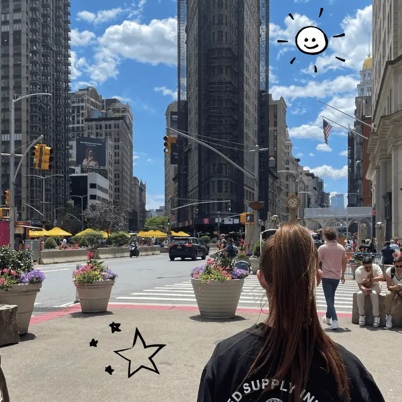 New York City scene with the famous wedge building in shot.