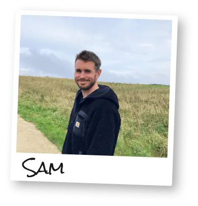 Polaroid photo of male blogger in the UK countryside